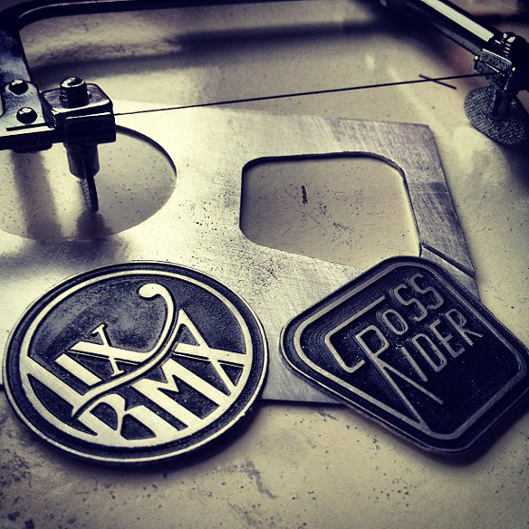 Custom bike head tube badges cut out